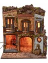 Pueblo iluminado con horno y fuente en funcionamiento estilo