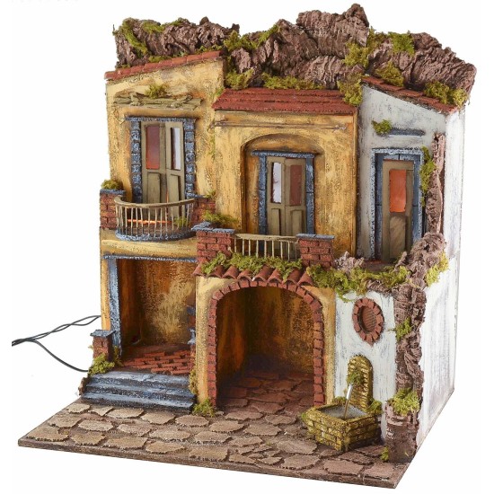 Illuminated village with functioning 18th century style oven and fountain