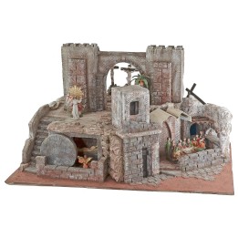 Illuminated Easter nativity scene complete with statues
