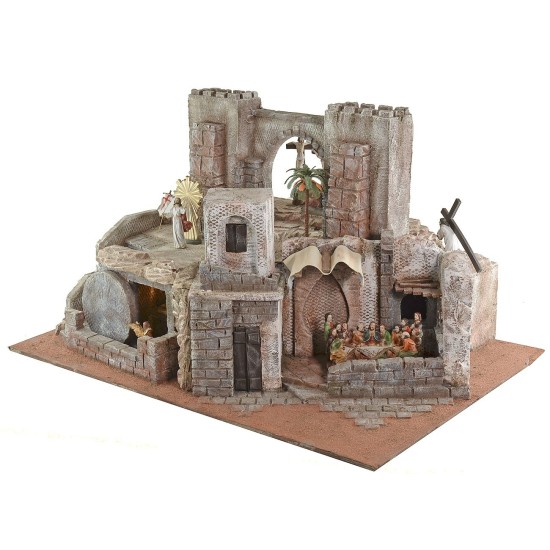 Illuminated Easter nativity scene complete with statues