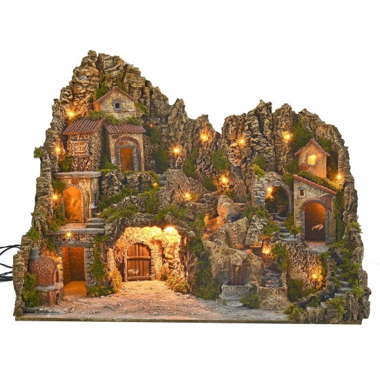 Pesebre iluminado con cueva, fuente, cascada y fuego
