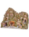 Illuminated nativity scene with a grotto, fountain, waterfall