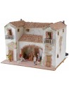 Stucco farmhouse with working lit fireplace complete with