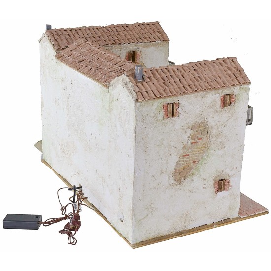 Stuccoed farmhouse with working illuminated fire complete with