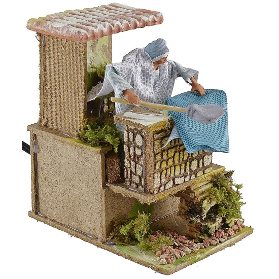 Mujer golpea ropa 10 cm en movimiento Mundo Pesebres