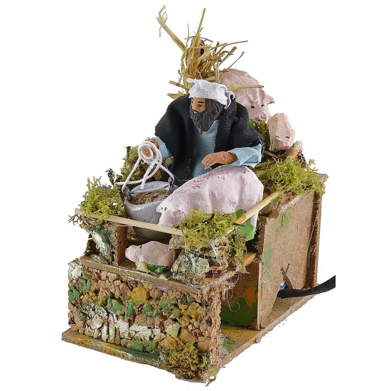 Criador de cerdos en movimiento 10 cm Mundo Pesebres