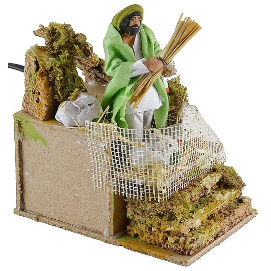 Contadino in movimento che ciba i conigli Mondo Presepi