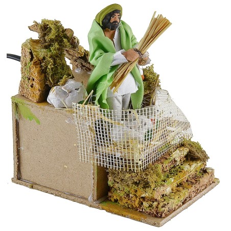 Contadino in movimento che ciba i conigli Mondo Presepi