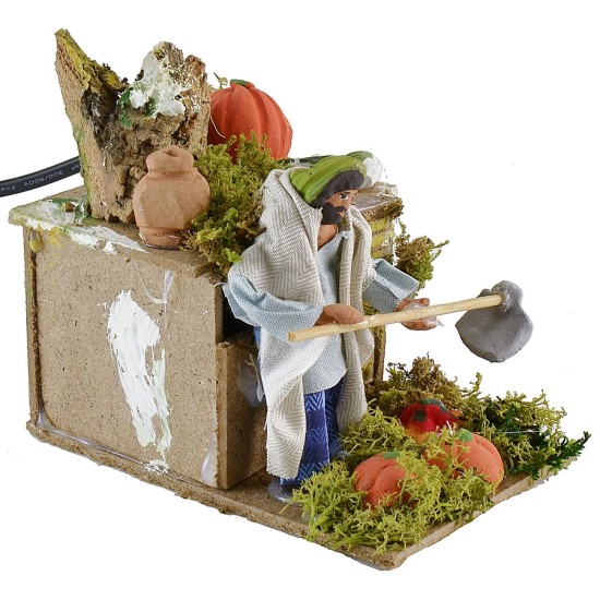 Granjero que cava en movimiento 10 cm Mundo Pesebres