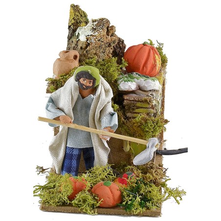 Granjero que cava en movimiento 10 cm Mundo Pesebres