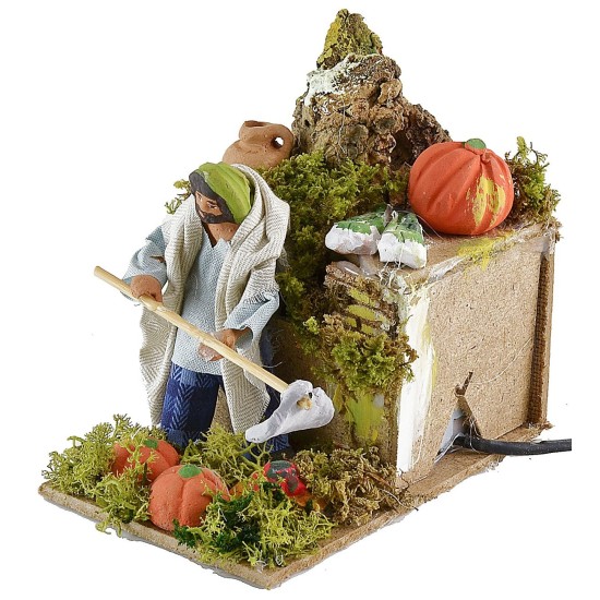 Granjero que cava en movimiento 10 cm Mundo Pesebres