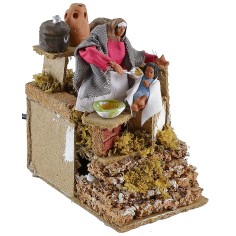 Mamma che ciba il bambino in movimento 10 cm Mondo Presepi 2