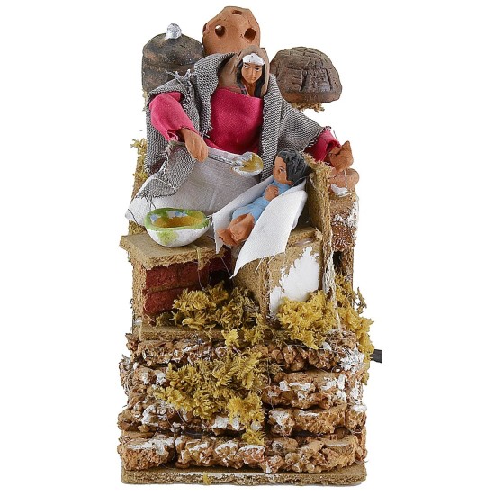 Mom feeding the baby moving 10 cm