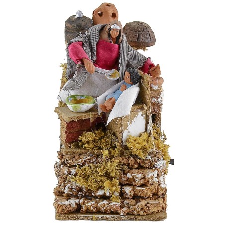 Mamma che ciba il bambino in movimento 10 cm