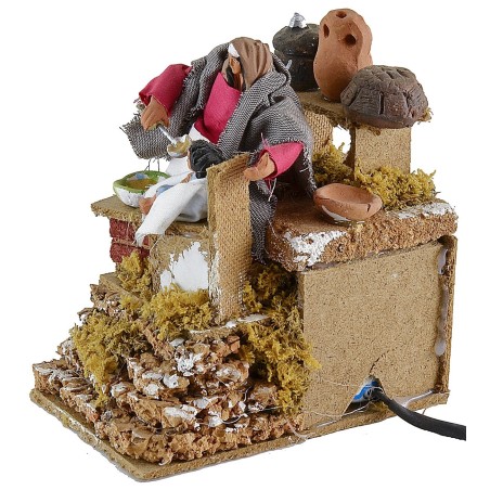 Madre que alimenta al niño en movimiento 10 cm Mundo Belenes