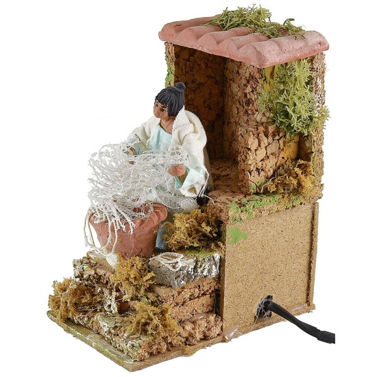 Woman sewing the fishing net