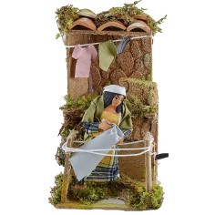 Woman on the move drying clothes