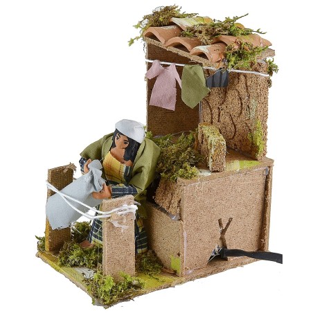 Donna in movimento che stende i panni Mondo Presepi