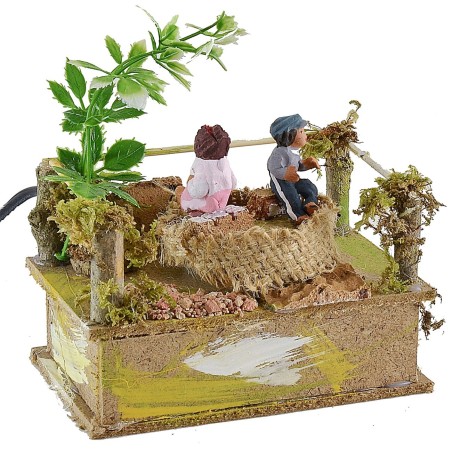 Carrusel con niños de 14x8,5 cm serie 10 cm en movimiento