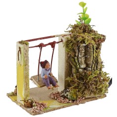 Niño en el columpio serie 10 cm en movimiento Mundo Pesebres 2