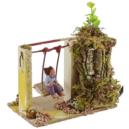 Bambino sull'altalena serie 10 cm in movimento Mondo Presepi