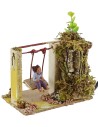 Niño en el columpio serie 10 cm en movimiento