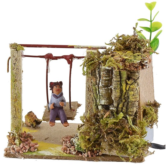 Niño en el columpio serie 10 cm en movimiento Mundo Pesebres
