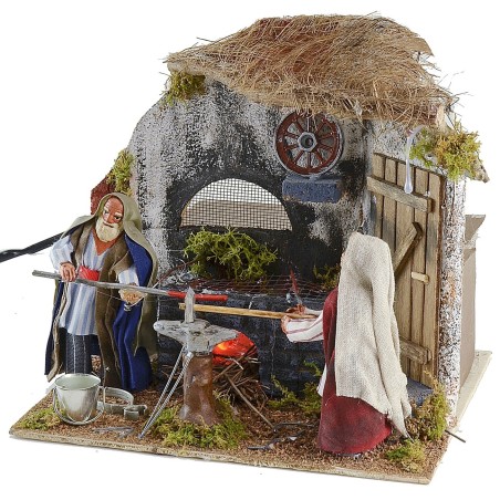 Locksmith 10 cm in motion with fire cm 20x18x19 h.