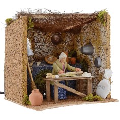 Mujer de 10 cm que amasa en movimiento 18x20x18 h. Mundo Pesebres 2