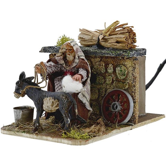 Hombre de 8 cm que cepilla al burro en movimiento cm