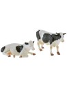 Coloca 2 vacas moteadas en PVC