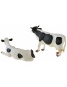 Coloca 2 vacas moteadas en PVC