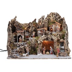 Illuminated nativity scene with working oven and waterfall, complete with