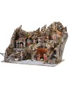 Illuminated nativity scene with functioning oven and waterfall