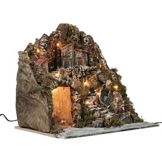 Illuminated nativity scene with waterfall and functioning