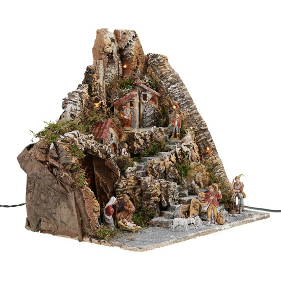 Illuminated nativity scene with working fountain and complete with statues