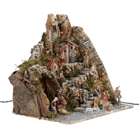 Pesebre iluminado con fuente funcional y completo con estatuas.