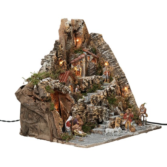 Illuminated nativity scene with working fountain and complete with statues