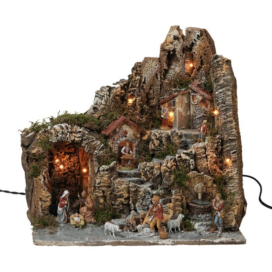 Presepe illuminato con fontana funzionante e completo di statue