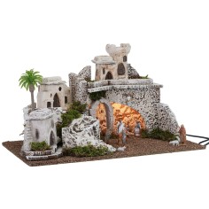 Illuminated nativity scene in Palestinian style with Landi statues 2