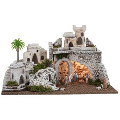 Illuminated nativity scene in Palestinian style with Landi statues