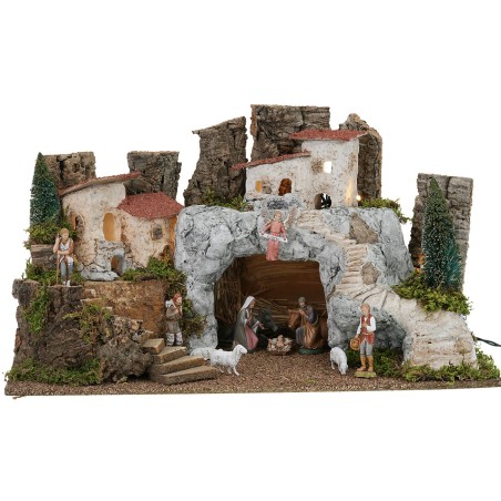 Presepe con grotta in pietra bianca completo di statue Landi