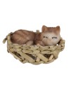 Cat in assorted patterns sleeping in a basket Ø 4 cm