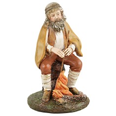 Pastor sentado frente al fuego serie 12 cm en resina Martino