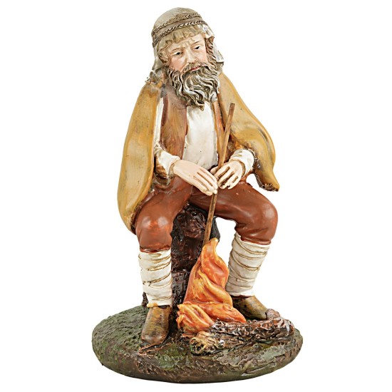 Shepherd sitting in front of the fire series 12 cm in resin