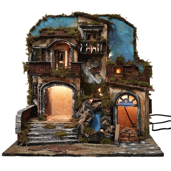 Illuminated nativity scene with a working waterfall and fire effect