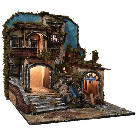 Illuminated nativity scene with a working waterfall and fire effect