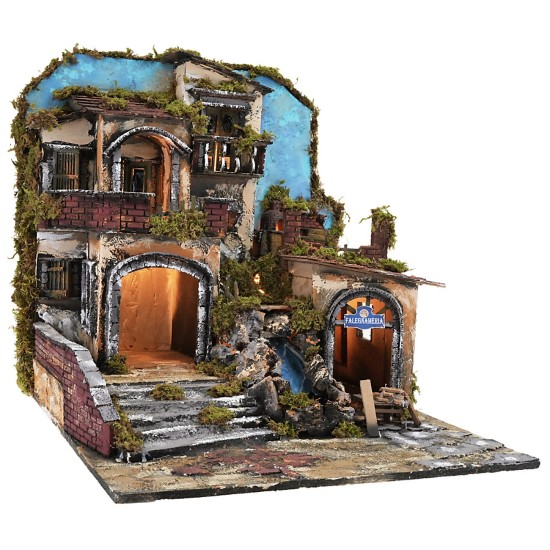 Illuminated nativity scene with a working waterfall and fire effect