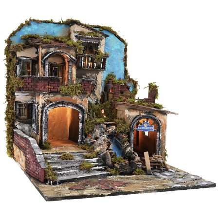 Illuminated nativity scene with a working waterfall and fire effect