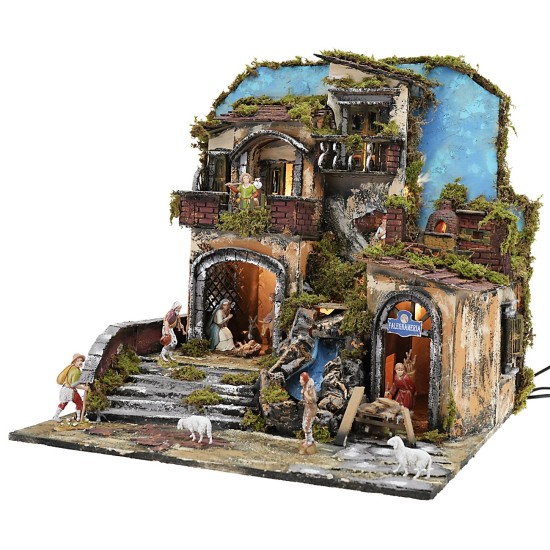 Illuminated nativity scene with functioning waterfall and fire effect